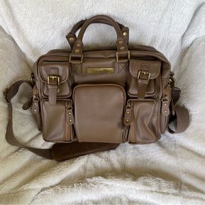 Evermore by House of Flynn.  Gorgeous Bag with multi pockets .  Like new .